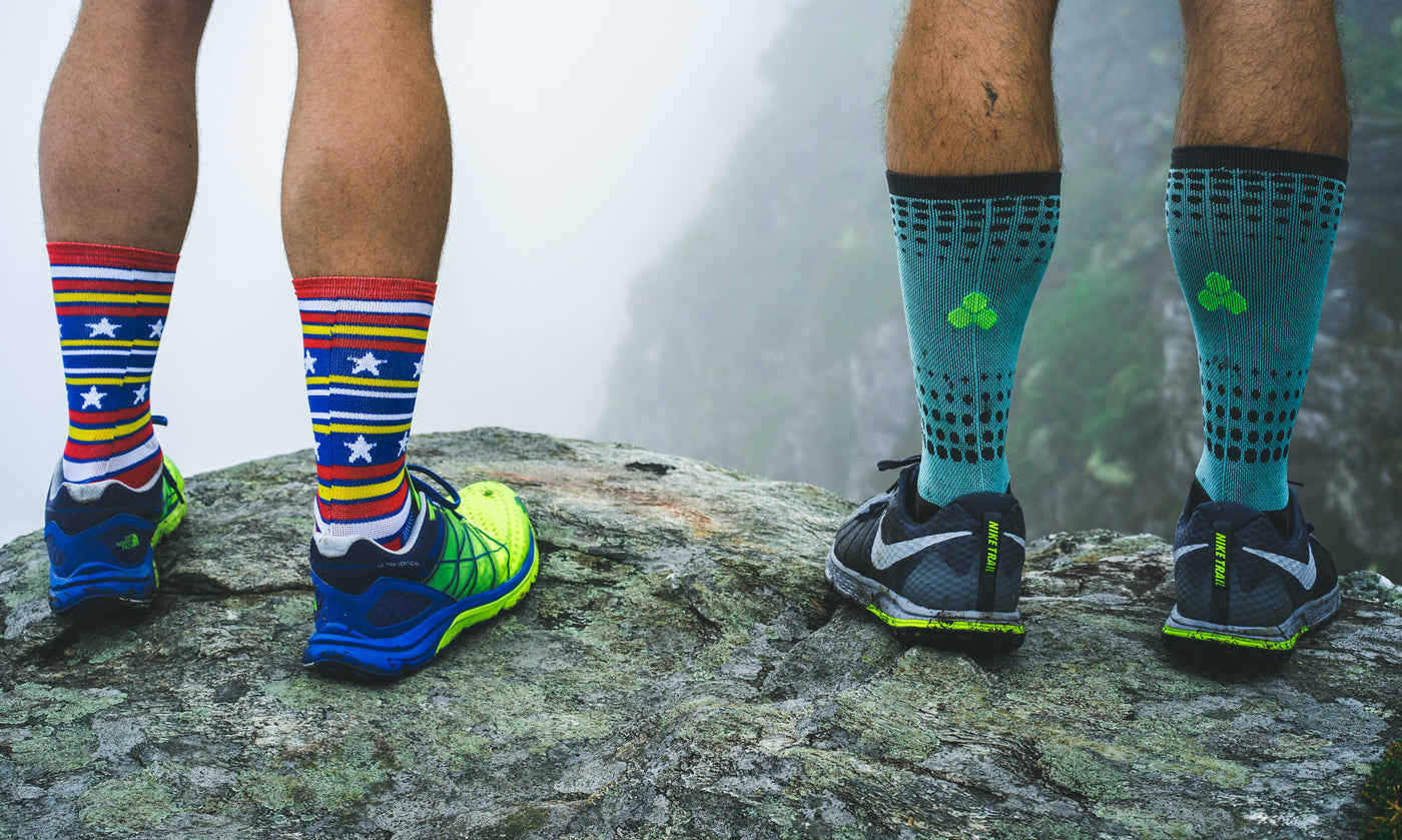Fitsoks on runners Standing on a mountain